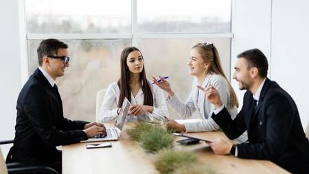 dress for success what to wear to a business meeting man writing a resumes